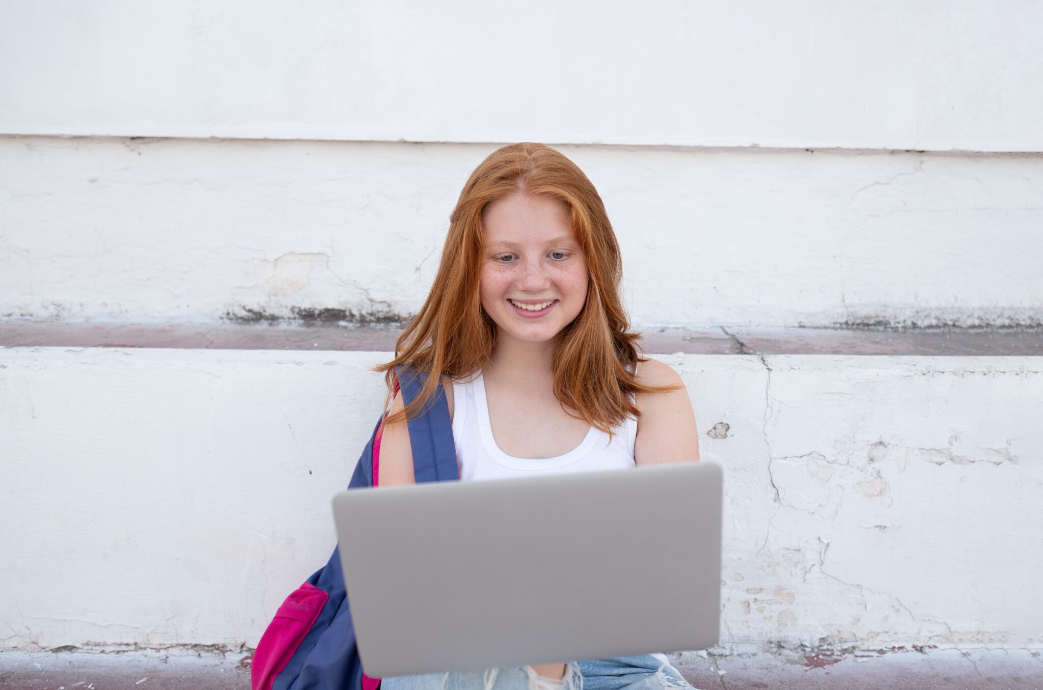 teen-girl-sitting-at-a-laptop-on-line-learning-c-2023-11-27-04-51-39-utc